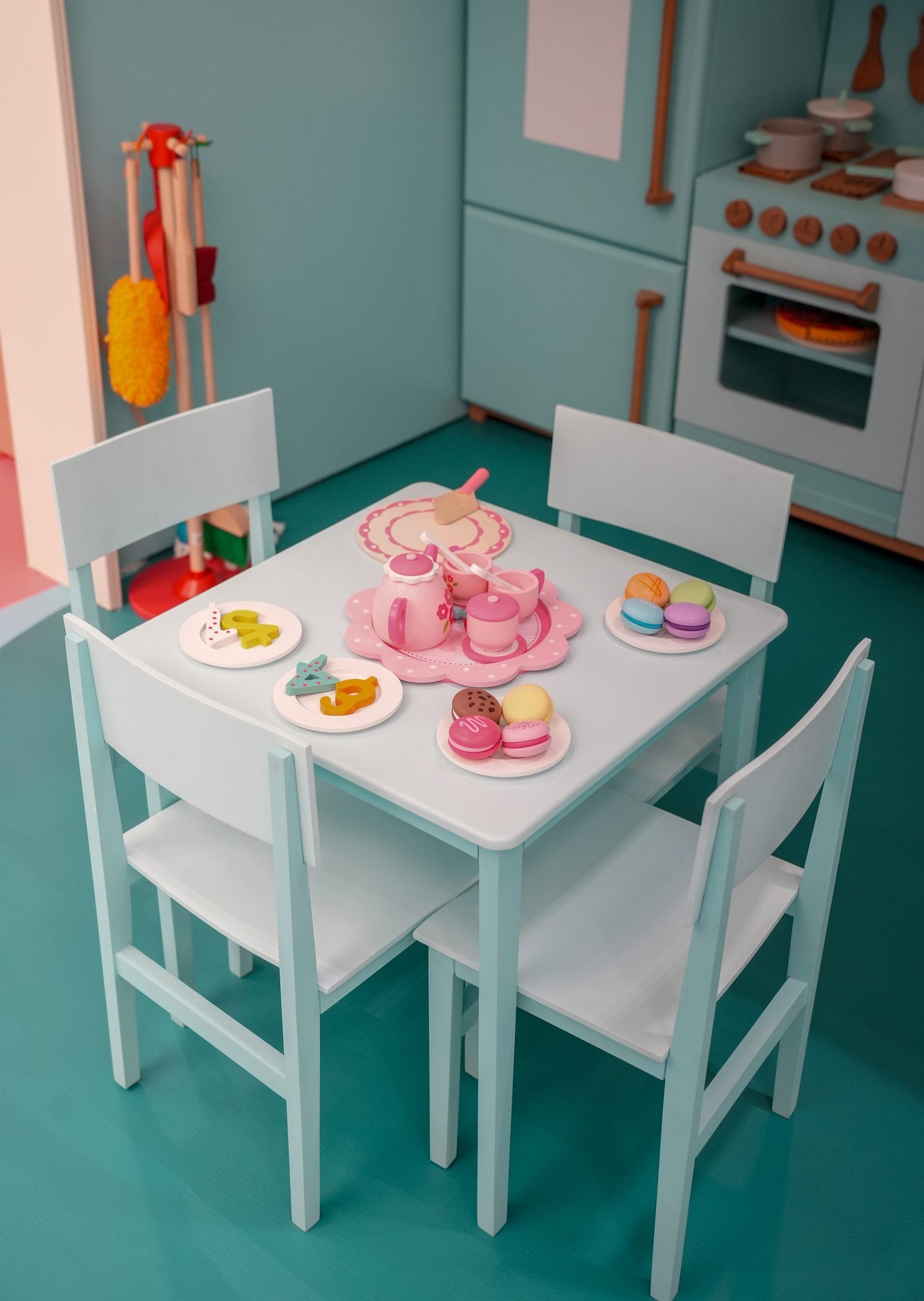 Pretend-play tea table and kitchen at BlueBalloonia