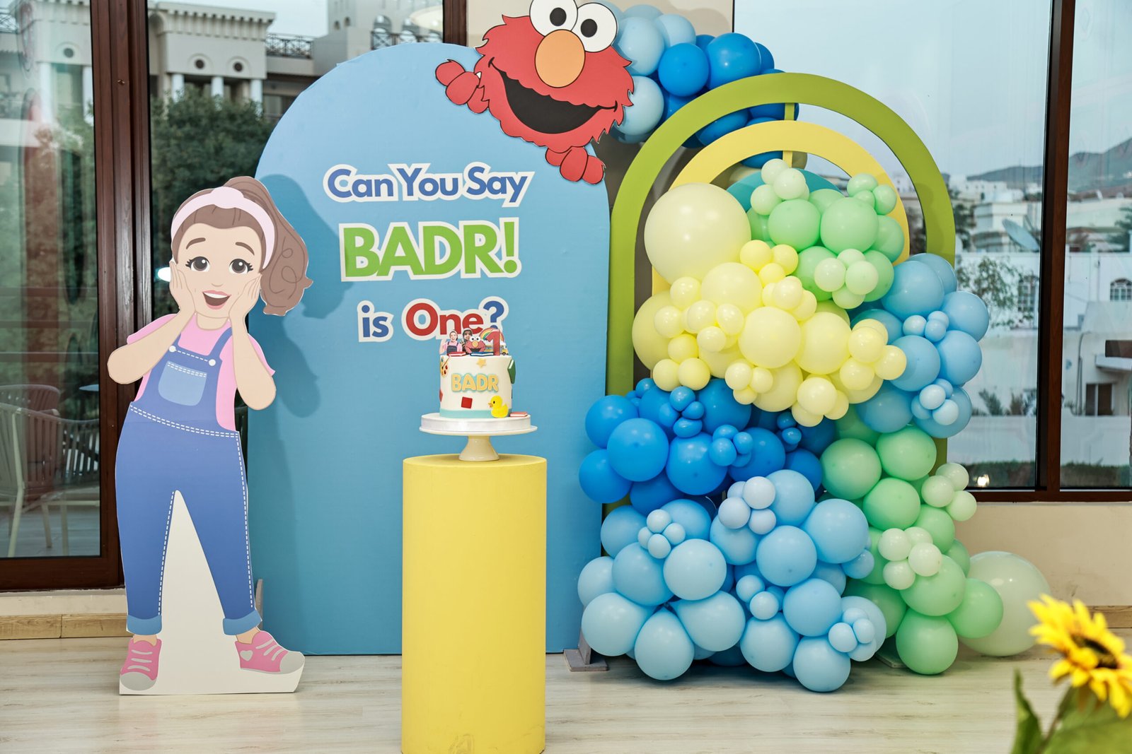 Colourful character-inspired first birthday setup