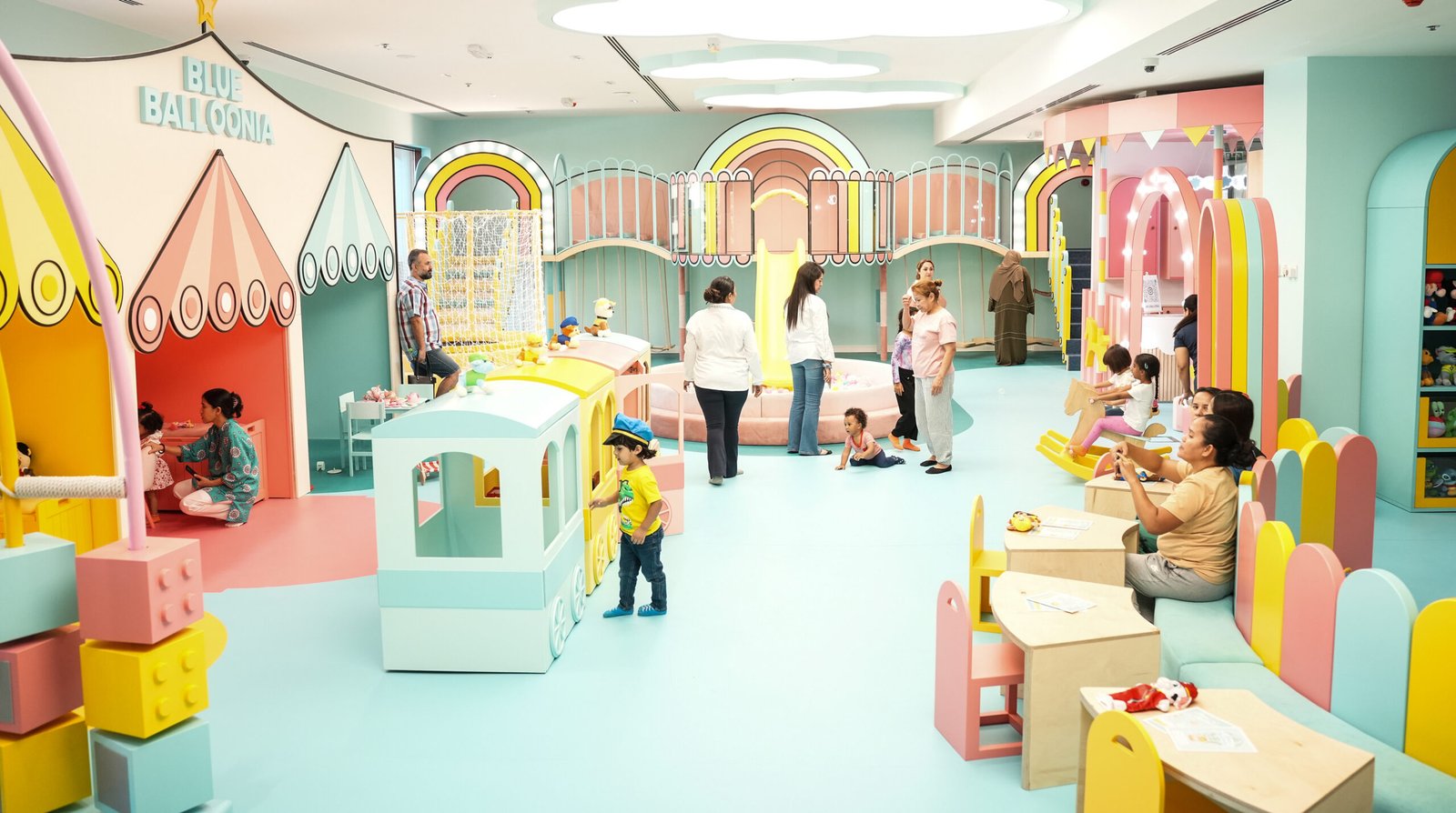 Families in the colourful BlueBalloonia indoor playground