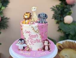 Pink animal-themed cake